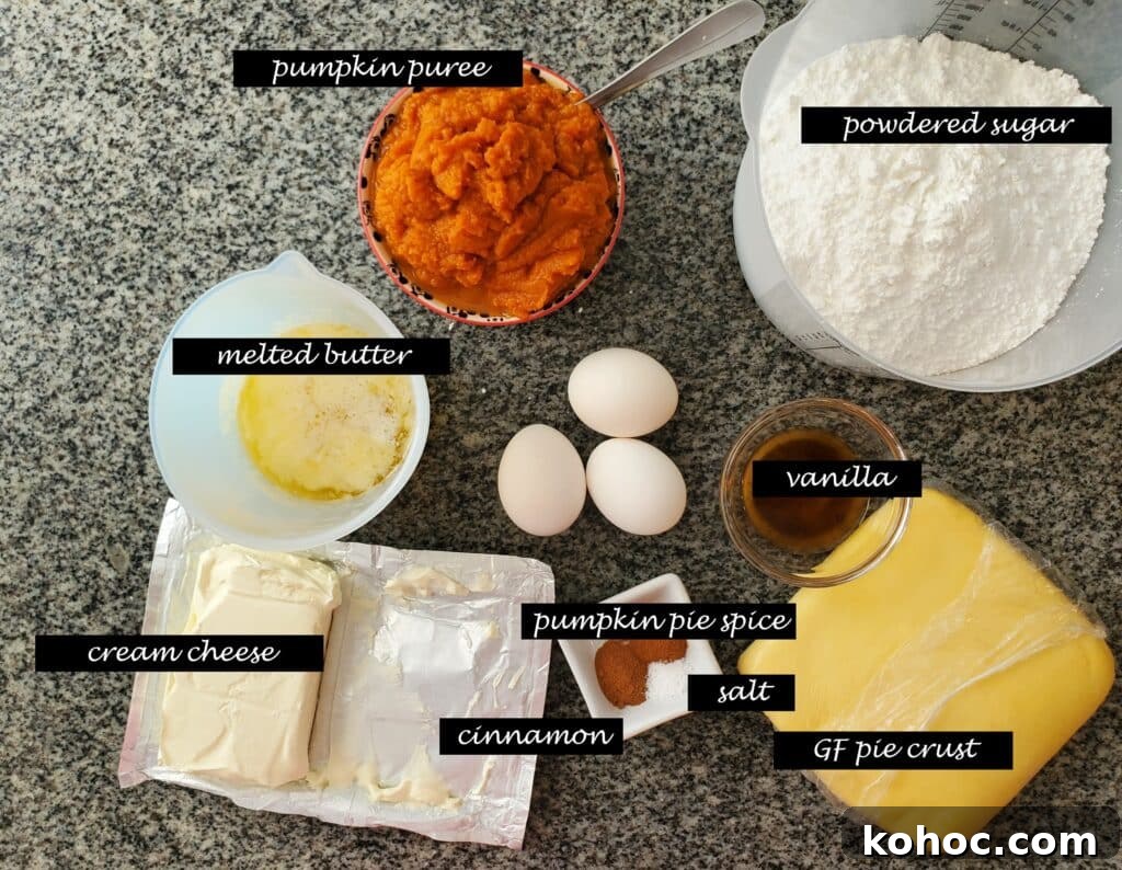 Gluten-Free Cream Cheese Pumpkin Pie Recipe 3 ingredients measured out on granite countertop.