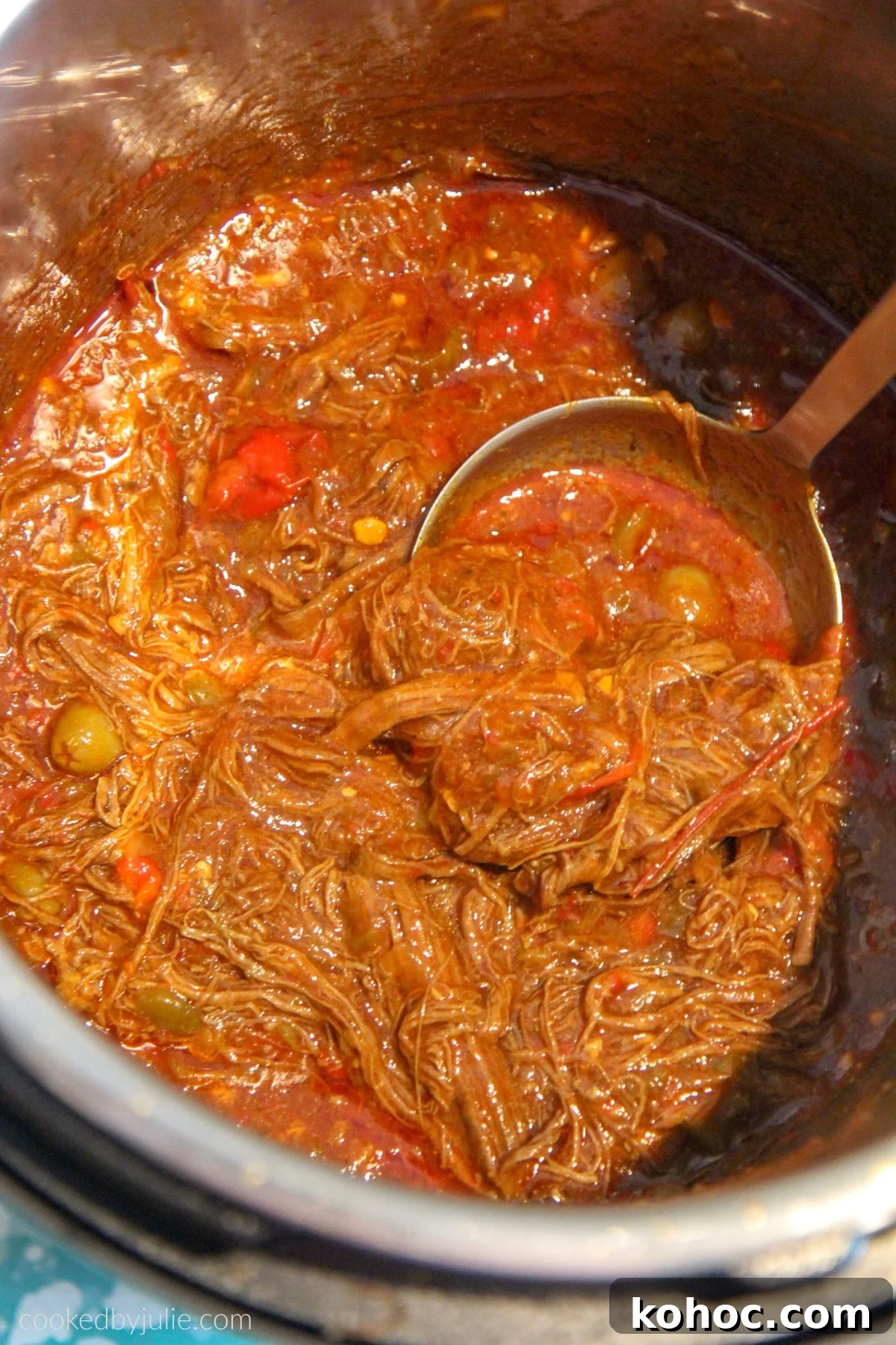 shredded flank steak in a tomato broth 