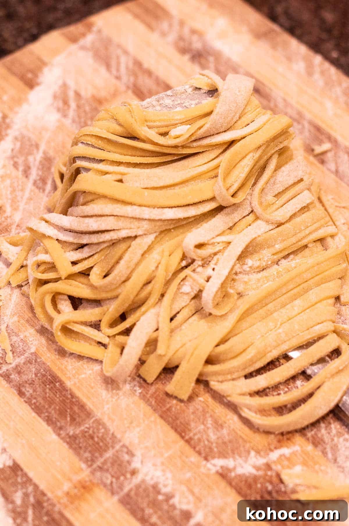 15-Minute Homemade Gluten-Free Sourdough Egg Noodles Recipe 4 Gluten Free Egg Noodles fresh on a cutting board