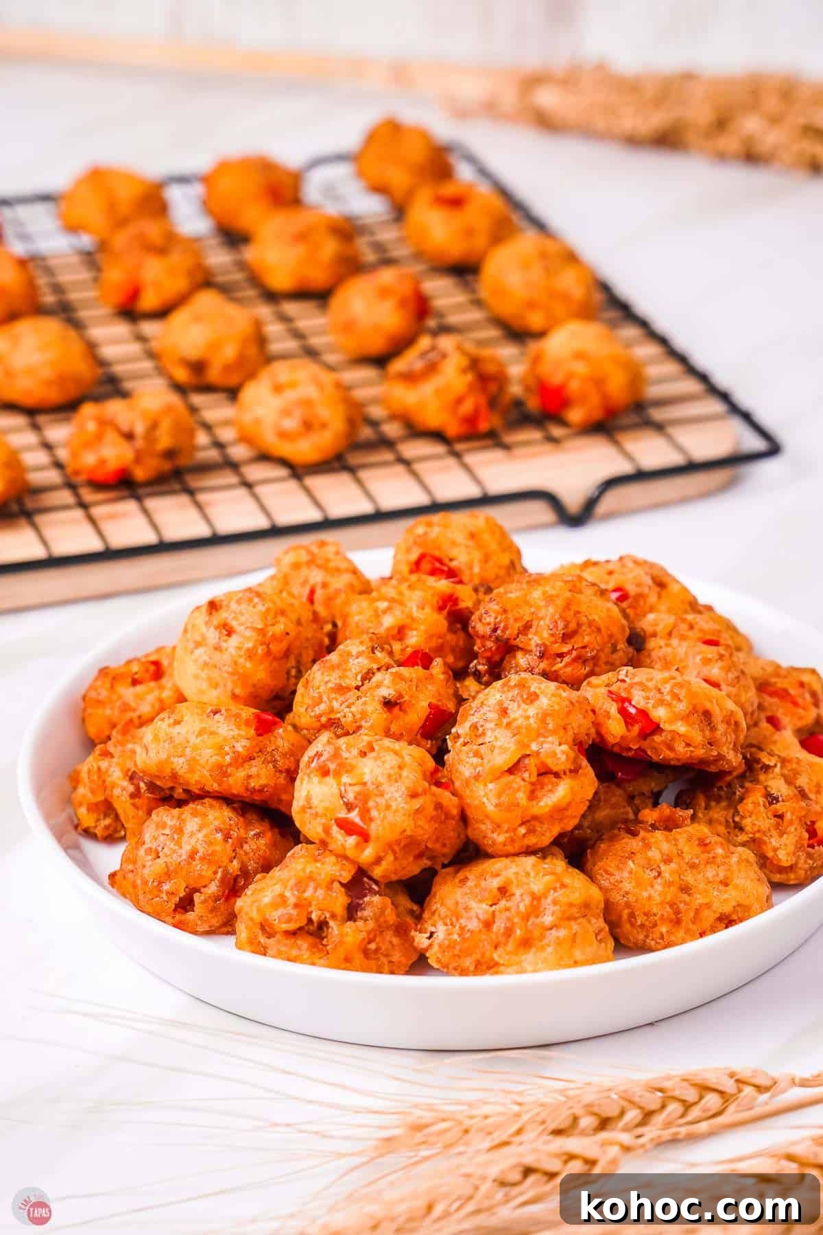 Pimento Cheese Sausage Balls: Southern Party Appetizer Recipe 7 sausage balls on a plate