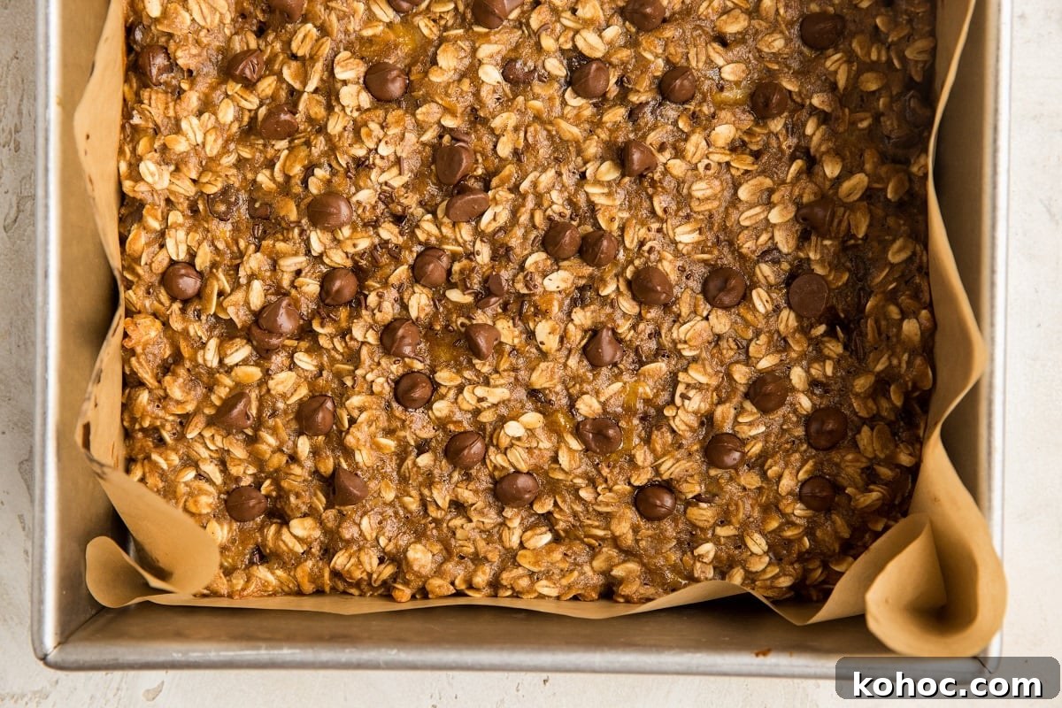 4-Ingredient Banana Oatmeal Bars Recipe for Quick Snacks 9 Finished oatmeal bars in a baking sheet fresh out of the oven