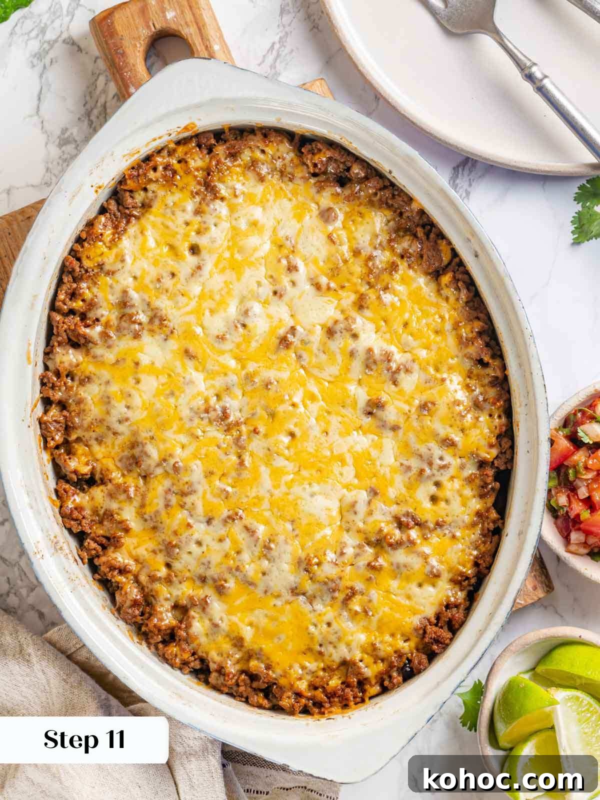 Cheesy Taco Casserole Bake with Ground Beef and Corn 13 baked melted cheese in taco casserole dish.