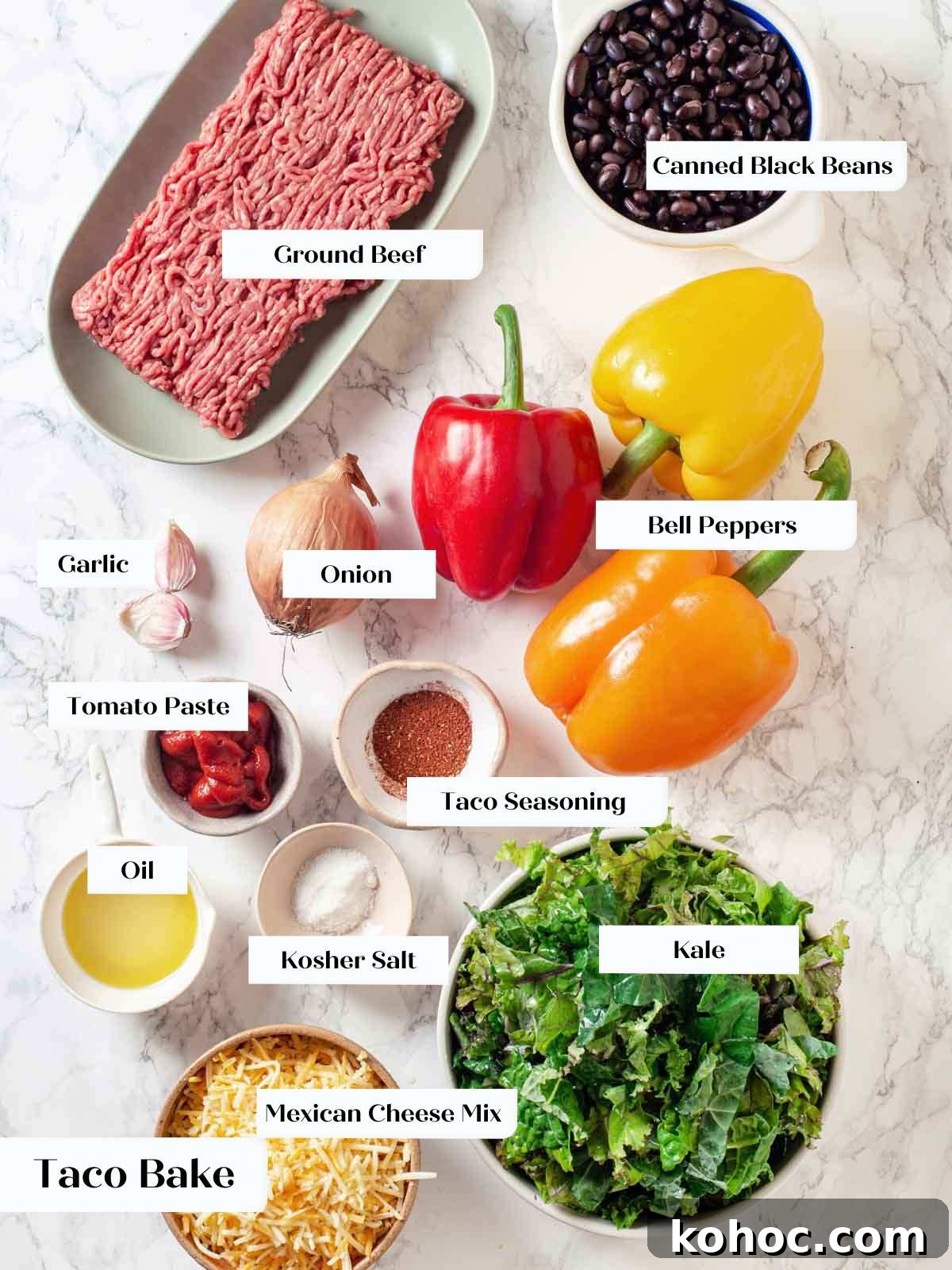 Cheesy Taco Casserole Bake with Ground Beef and Corn 5 taco bake ingredients on marble.