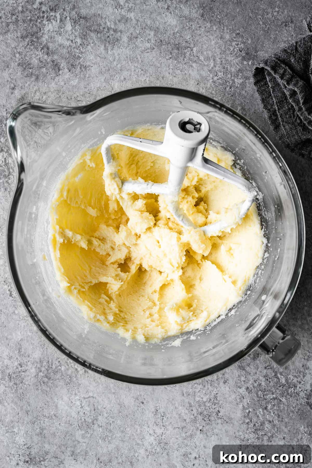 Matcha White Chocolate Cookies Recipe for Soft, Chewy Treats 6 Creamed butter and sugar with eggs and vanilla in a mixing bowl.