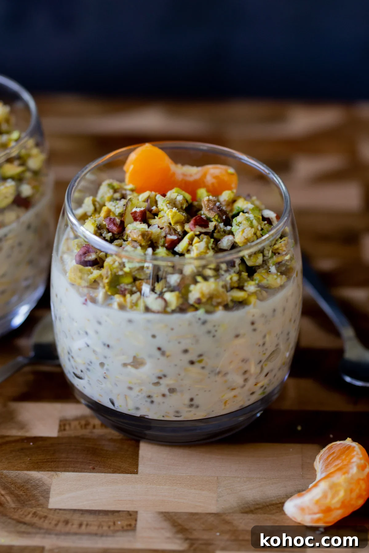 Baklava-Inspired Overnight Oats Recipe for Breakfast Bliss 2 baklava overnight oats topped with nuts and oranges