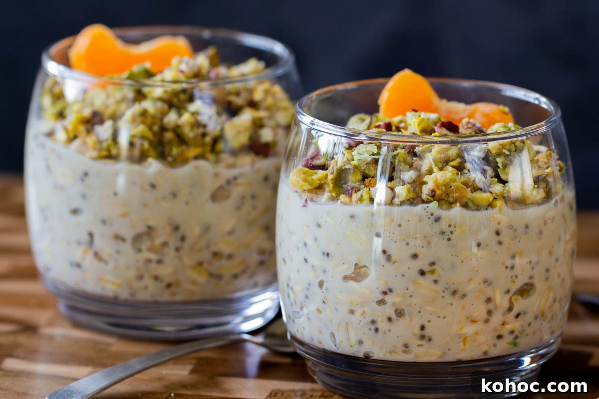 Baklava-Inspired Overnight Oats Recipe for Breakfast Bliss 11 2 glasses of baklava overnight oats topped with nuts and oranges
