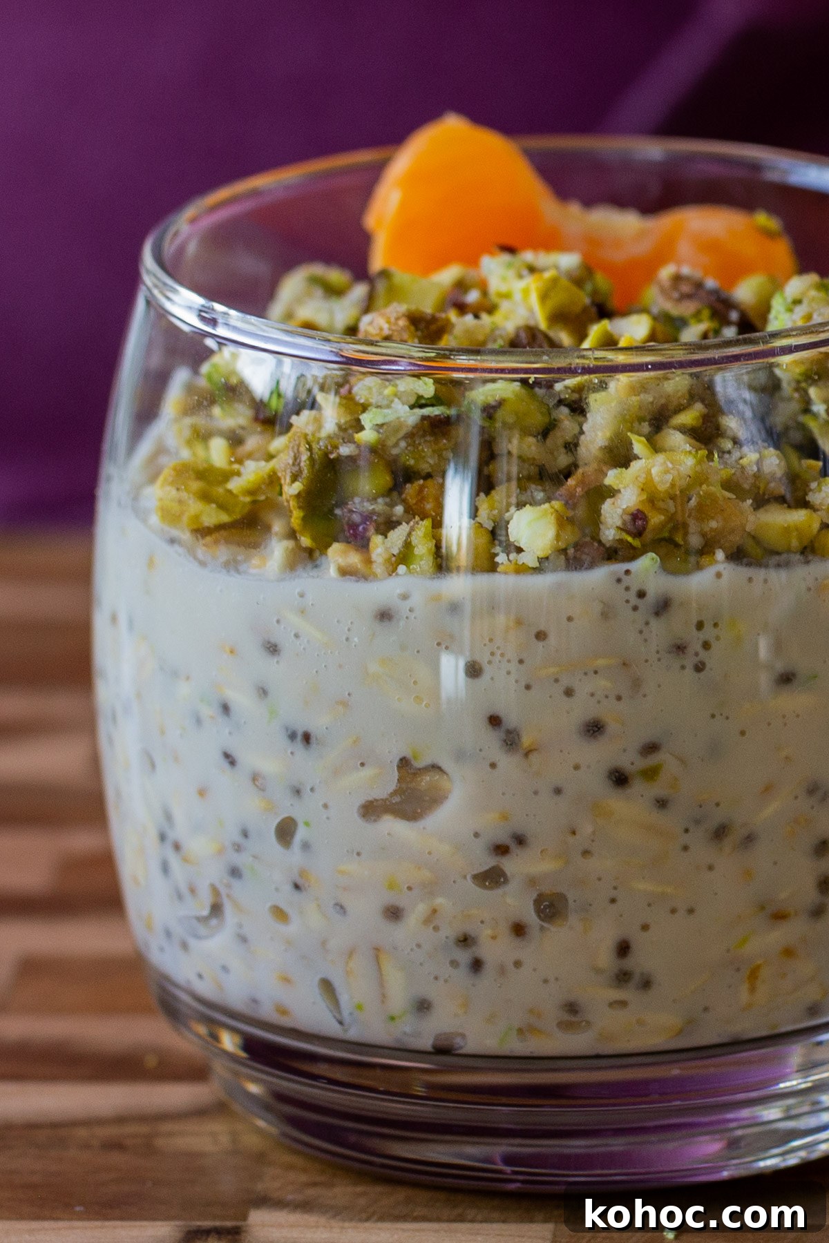 Baklava-Inspired Overnight Oats Recipe for Breakfast Bliss 4 close-up of baklava overnight oats topped with nuts and oranges