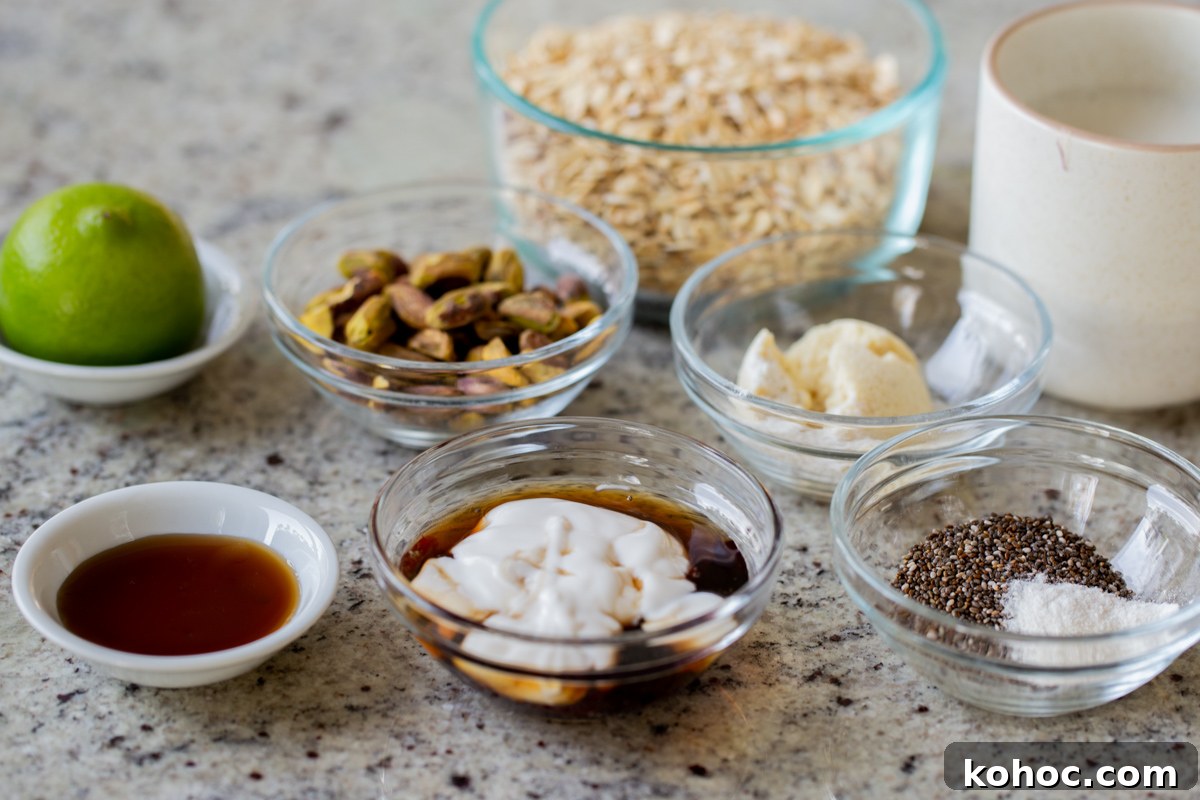 Baklava-Inspired Overnight Oats Recipe for Breakfast Bliss 6 rolled oats, nuts, and seasonings in bowls on a kitchen counter