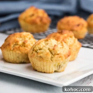 Banana Muffins on a white plate ready to eat.