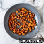 Crispy Sautéed Sweet Potatoes with Garlic and Herbs 6 Sautéed Sweet Potatoes in a skillet.