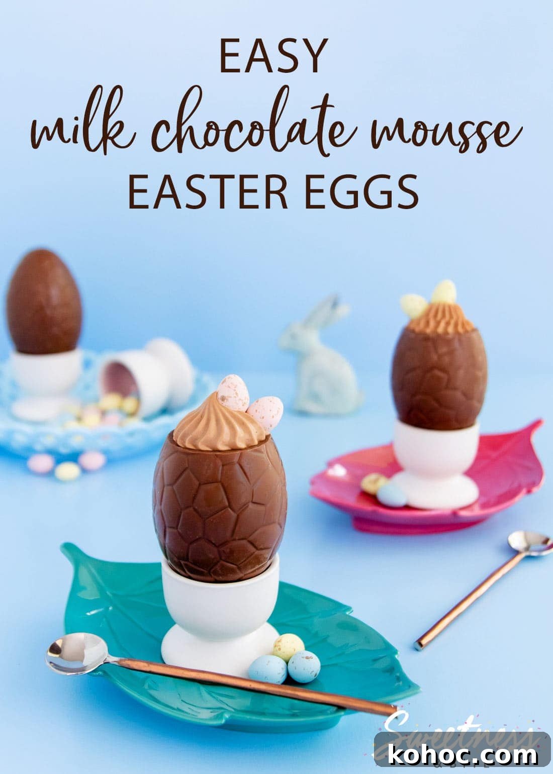 Milk Chocolate Mousse Easter Eggs Recipe for Spring Celebrations 2 Milk chocolate mousse filled Easter eggs, sitting in egg cups on green and pink plates.