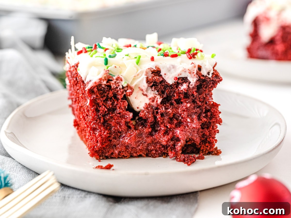 Simple Sheet Cake Recipes for Parties and Weeknight Desserts 9 Christmas red velvet Poke Cake on a plate