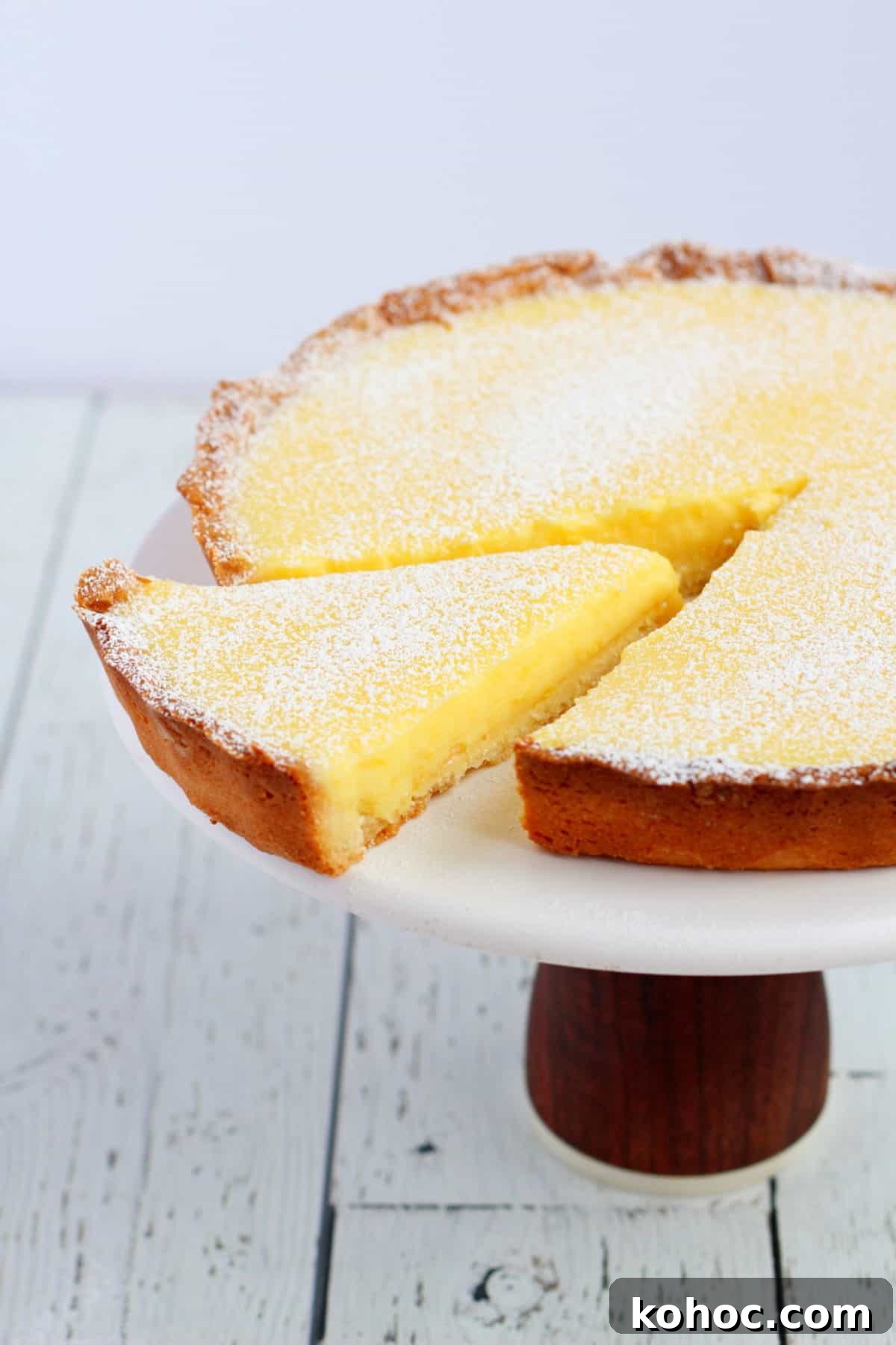 Classic French Lemon Tart Recipe: Authentic Pâtisserie-Style Guide 2 Lemon tart on cake stand