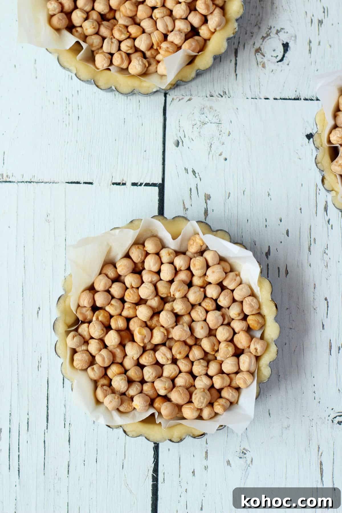 Classic French Lemon Tart Recipe: Authentic Pâtisserie-Style Guide 6 lemon tart shells filled with chickpeas how to bake