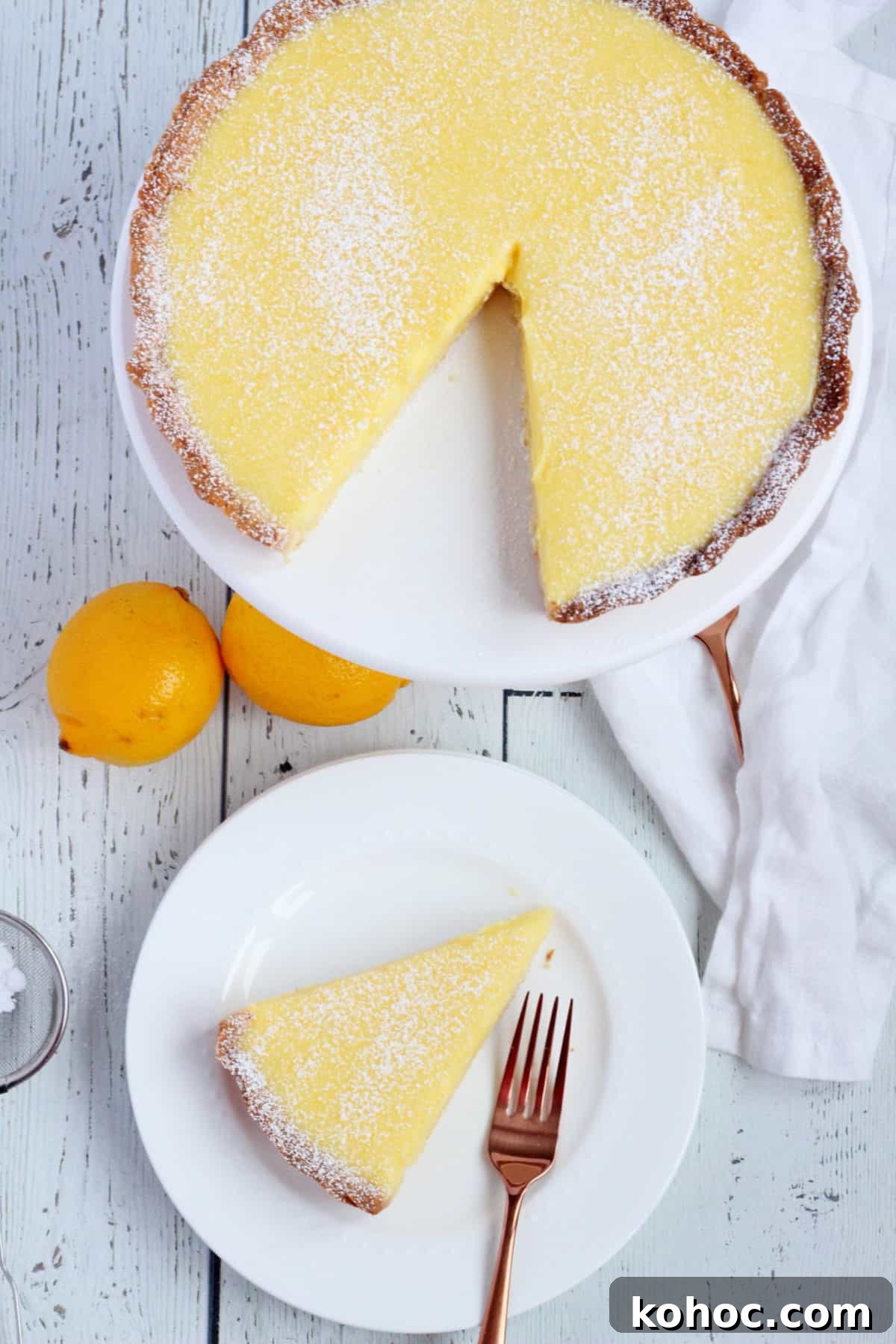 Classic French Lemon Tart Recipe: Authentic Pâtisserie-Style Guide 8 Lemon tart slice on white plate