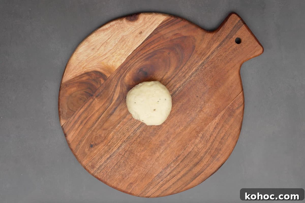 Authentic Bakarkhani Recipe: Flaky Bengali Bread Step-by-Step 11 Smooth round made.