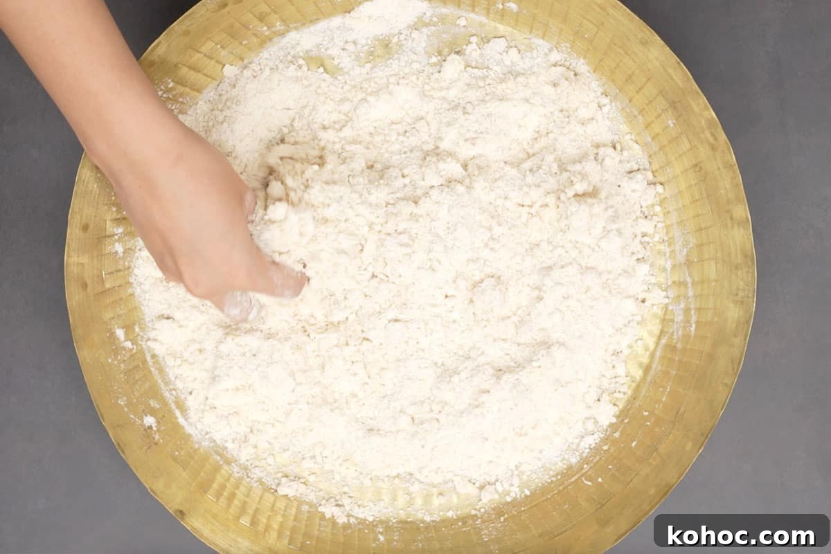 Authentic Bakarkhani Recipe: Flaky Bengali Bread Step-by-Step 4 Mixed well.