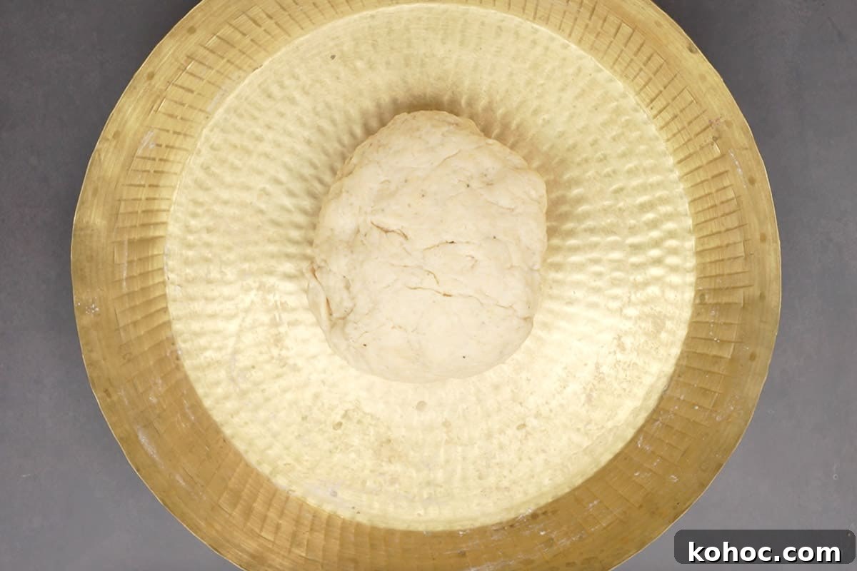 Authentic Bakarkhani Recipe: Flaky Bengali Bread Step-by-Step 7 Dough kneaded again.
