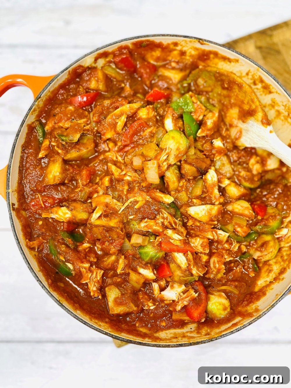 Leftover Turkey Curry Recipe for Quick Weeknight Meals 8 leftover turkey, sprouts and roast potatoes being stirred into a curry base sauce