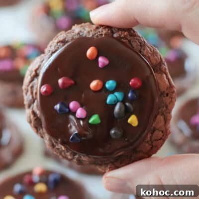 hand holding cosmic brownie cookie