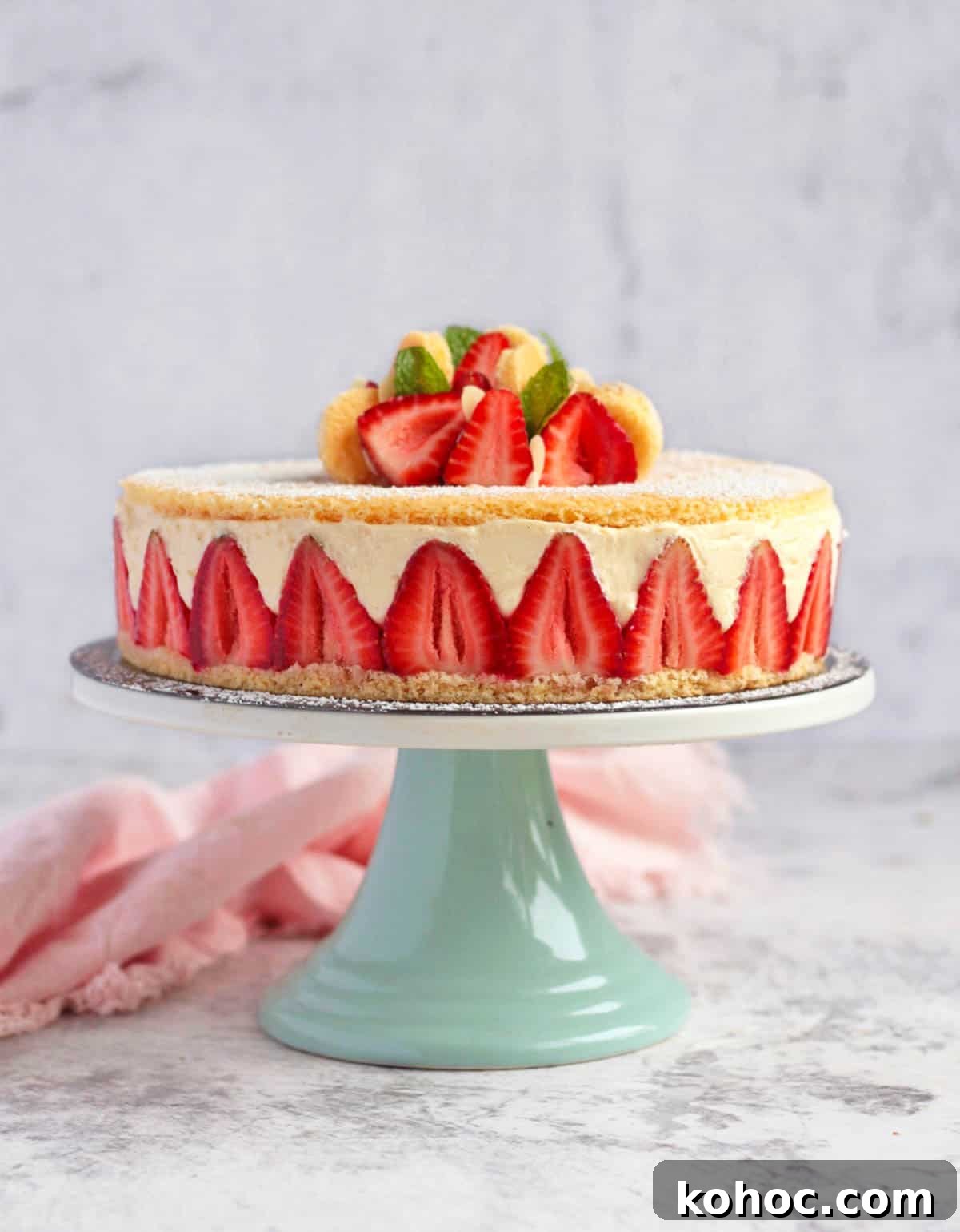 Strawberry Fraisier Cake with Silky Diplomat Cream Filling 9 Strawberry Fraisier on a Cake Stand.