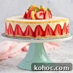 Strawberry Fraisier Cake with Silky Diplomat Cream Filling 10 Fraisier Cake on a Green Cake Stand