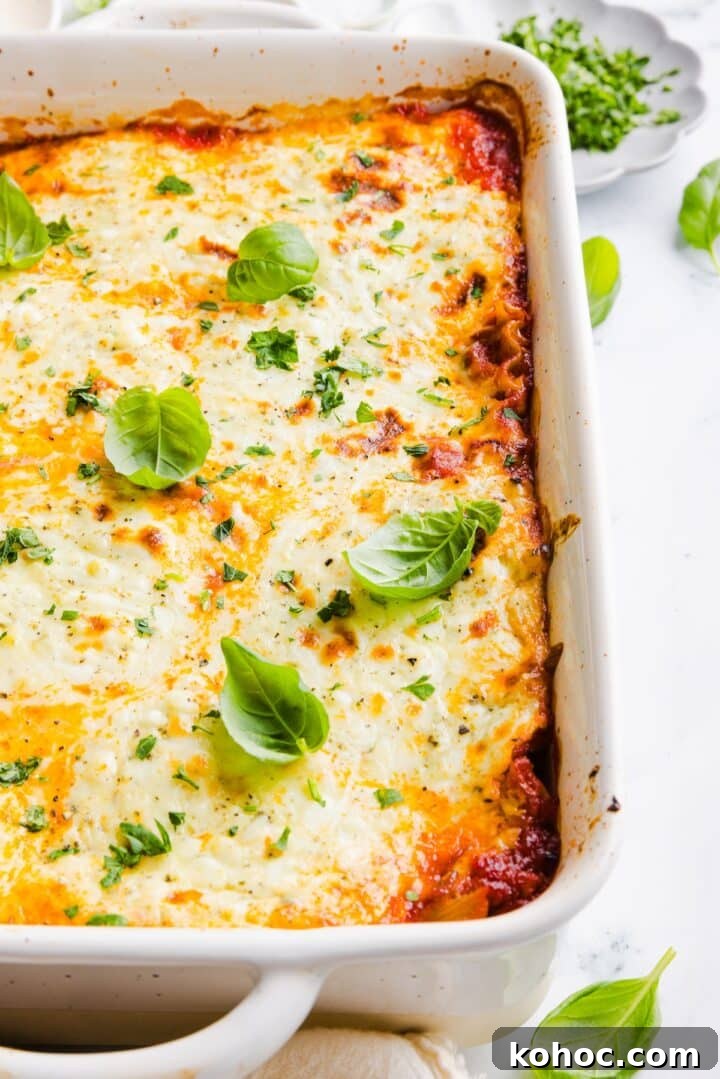 High-Protein Lazy Lasagna Recipe for Quick Meals 12 Close-up photo of a high protein lasagna in a baking dish, topped with fresh basil