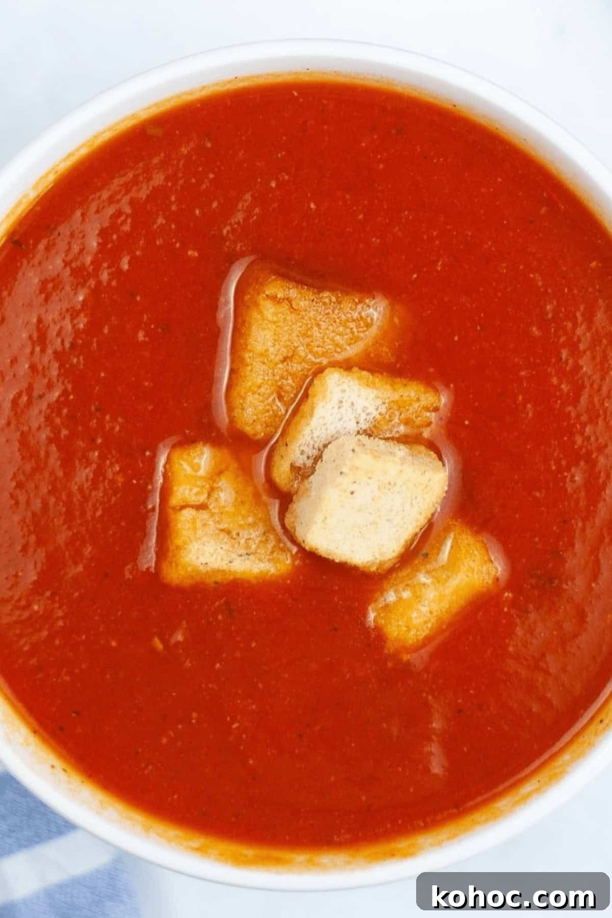 Creamy Instant Pot Tomato Soup Recipe for Quick Weeknight Meals 2 Instant Pot Tomato Soup garnished with crunchy croutons.