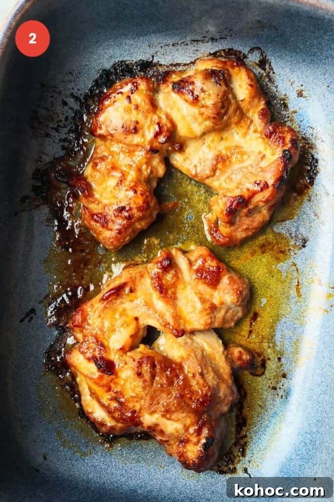 Juicy Chicken Poke Bowl Recipe for Fresh, Flavor-Packed Meals 5 Cooked miso chicken thighs in an oven dish.