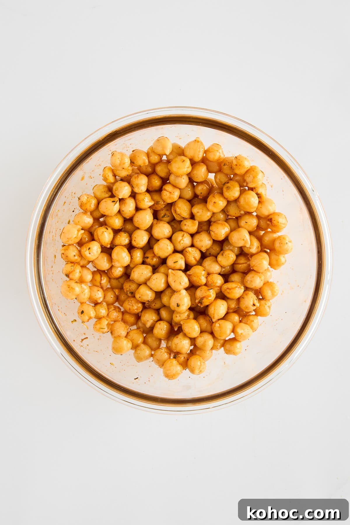Roasted Carrots & Chickpeas with Creamy Whipped Feta 6 Seasoned chickpeas in a bowl.