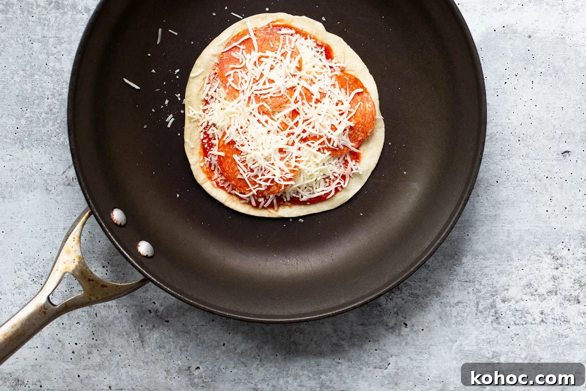 making a pizza quesadilla