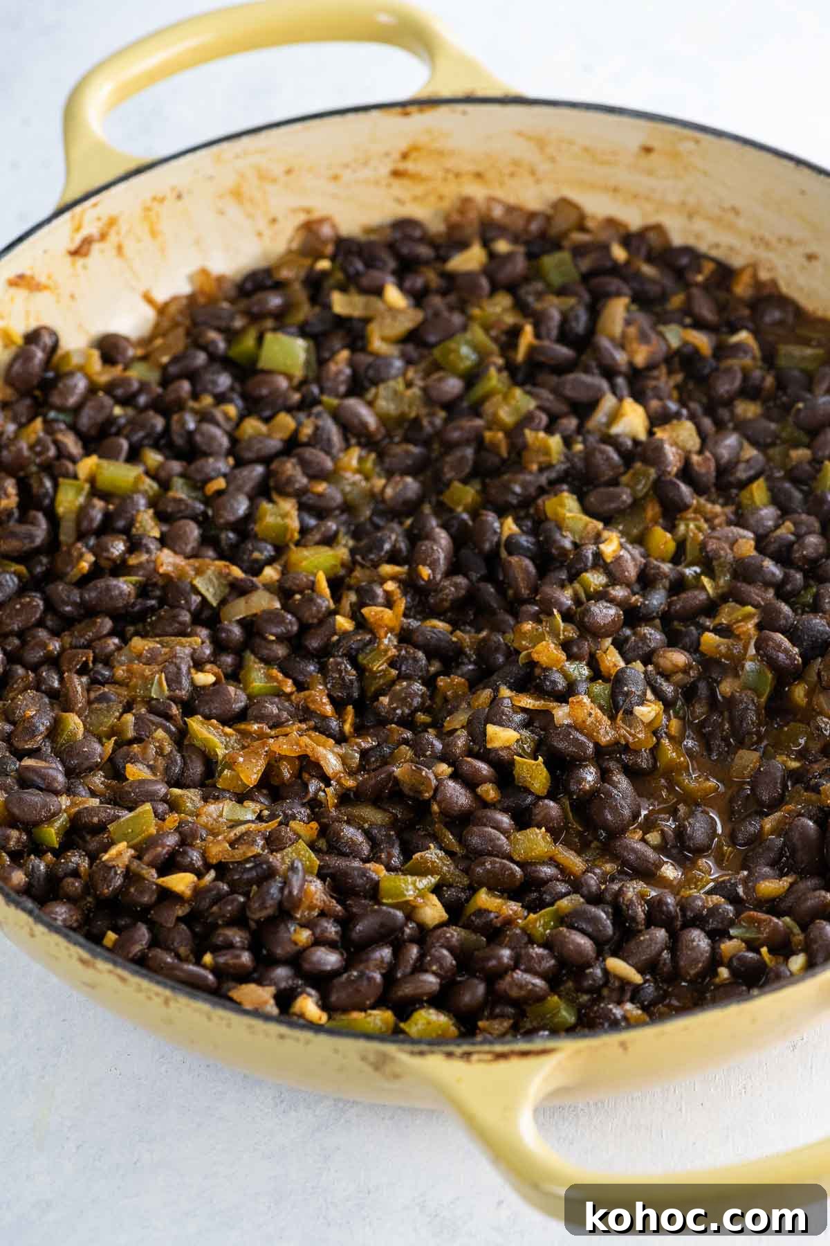 Flavorful Black Bean Vegan Tacos with Avocado Salsa 5 black beans for tacos in a pan