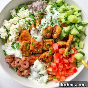 30 High-Protein Dinner Recipes for Muscle & Weight Goals 14 An Easy Greek Bowl filled with grilled chicken, veggies, and feta.