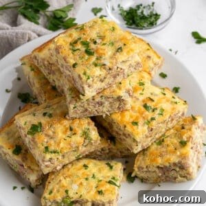 30 High-Protein Dinner Recipes for Muscle & Weight Goals 6 A plate of sausage and cheese breakfast casserole pieces.