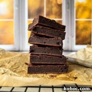 30 High-Protein Dinner Recipes for Muscle & Weight Goals 20 A stack of chocolate protein brownies.