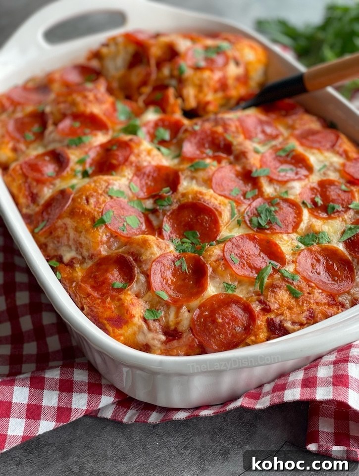 Bubble-Up Biscuit Pizza Casserole Recipe for Family Nights 2 This pepperoni pizza casserole is made with just four ingredients: Pillsbury refrigerated biscuits, pizza sauce, cheese, and the toppings of your choice, making for a quick and easy dinner for a family with kids.