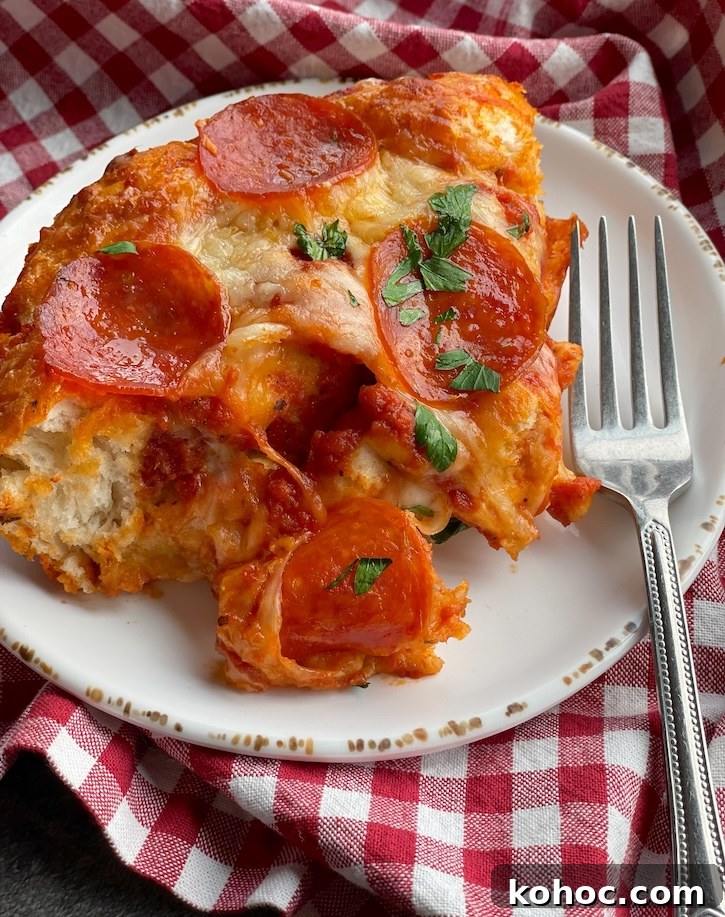 Bubble-Up Biscuit Pizza Casserole Recipe for Family Nights 3 This Biscuit Pepperoni Pizza Casserole is cheap and easy to make for dinner on busy weeknights, especially if you have picky kids at home.