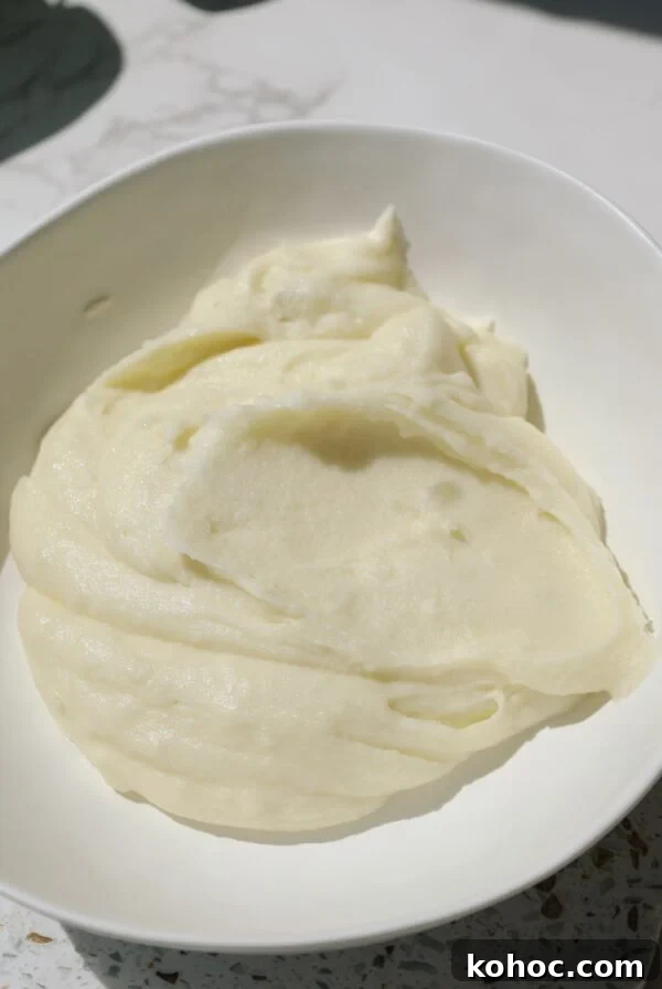 Creamy mashed potatoes in a large plate.