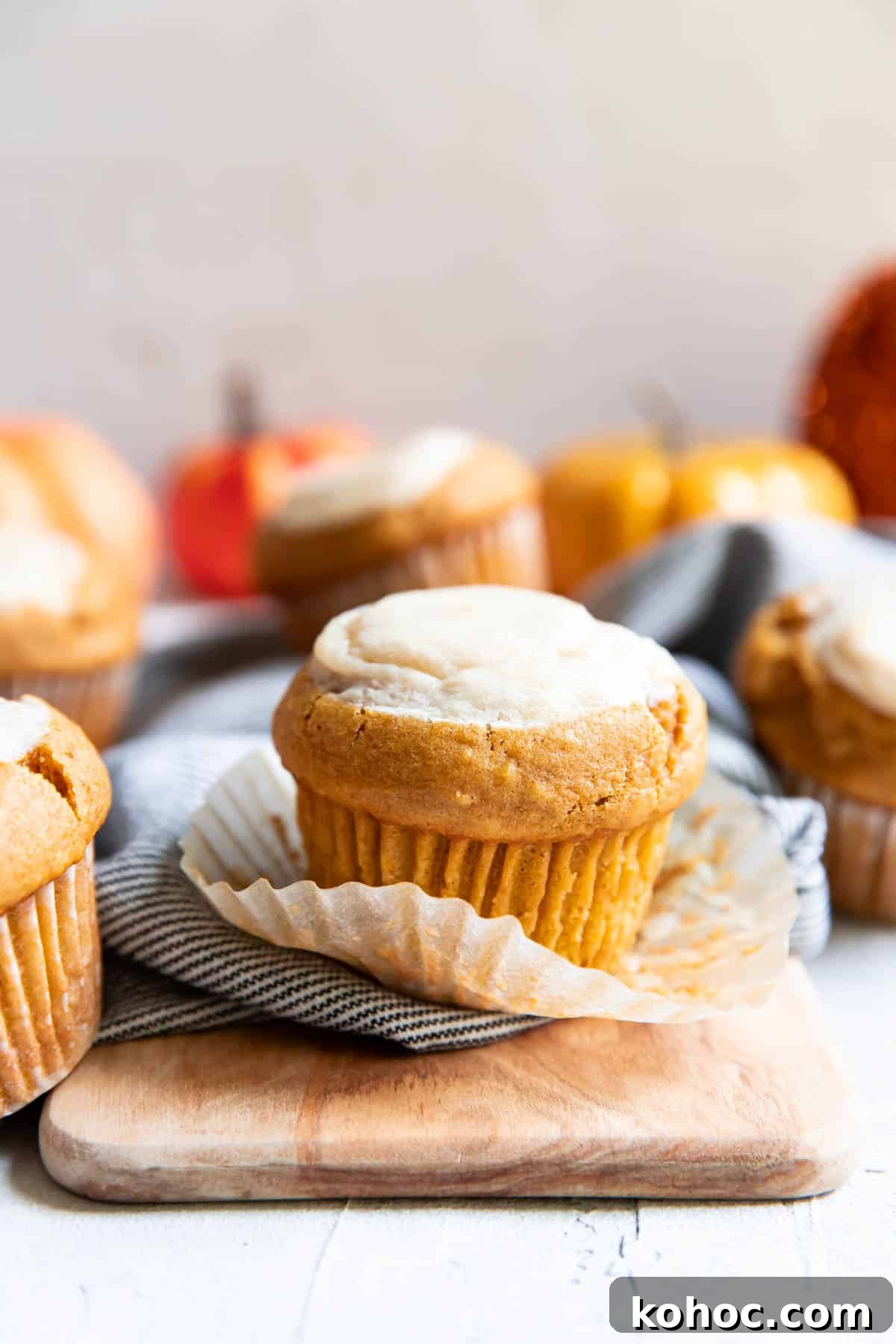 Moist Pumpkin Muffins with Cream Cheese Swirl 2 pumpkin cream cheese muffins.