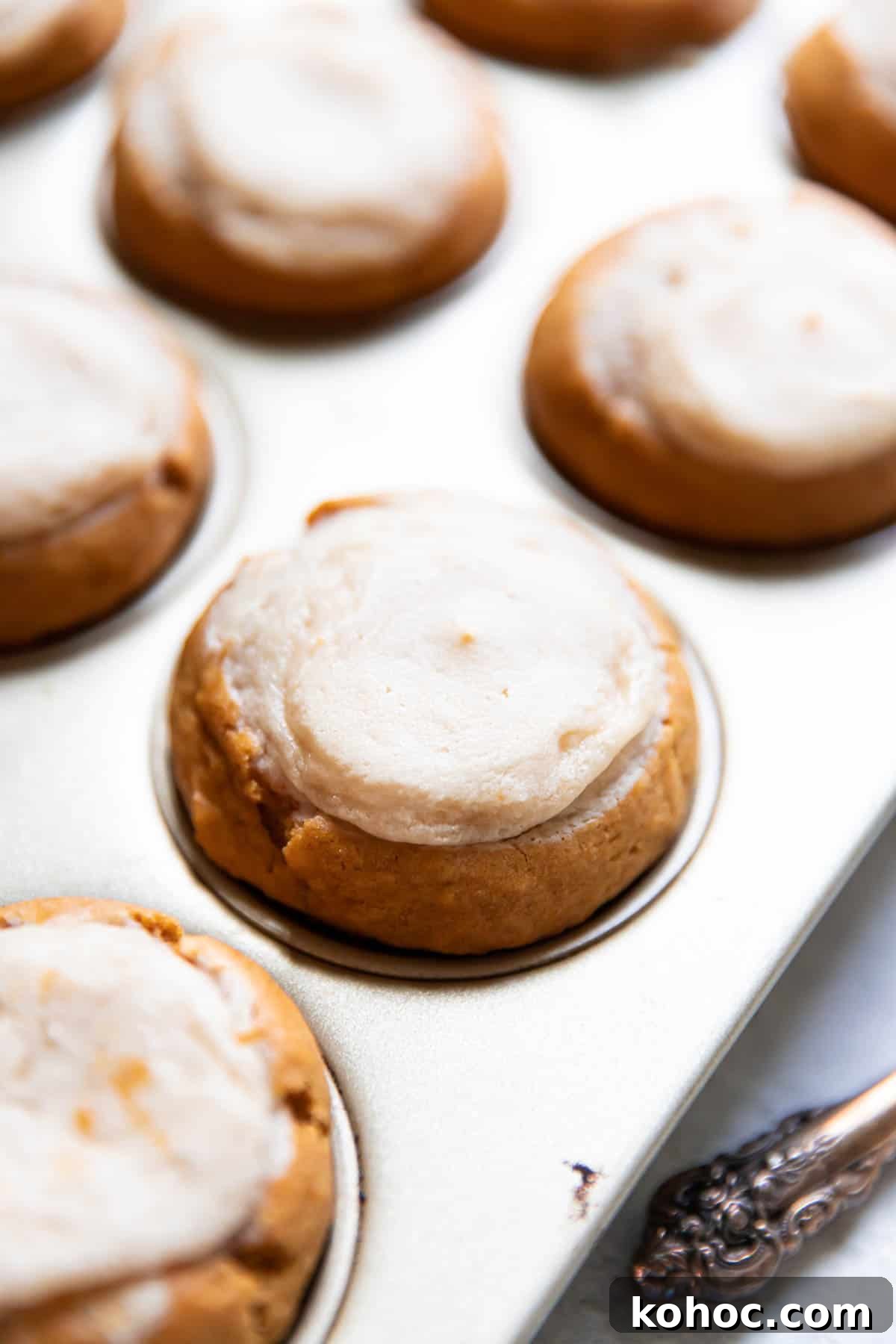 Moist Pumpkin Muffins with Cream Cheese Swirl 4 pumpkin cream cheese muffins.