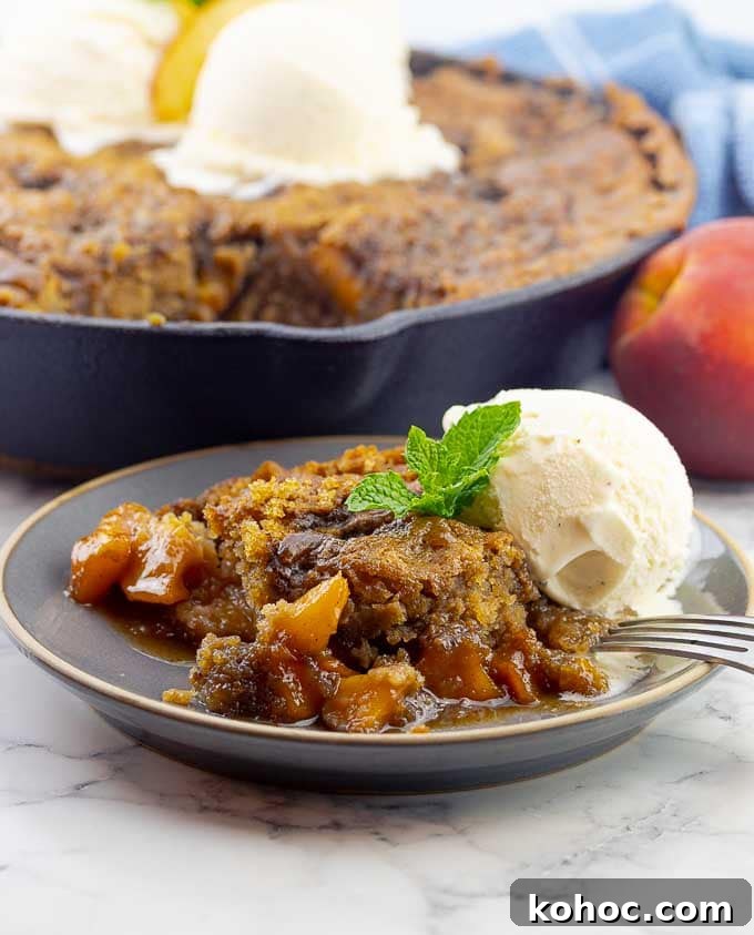 Grilled Fresh Peach Skillet Cake in a Cast Iron Pan 2 grilled fresh peach cast iron skillet cake and a plate of the cake with ice cream