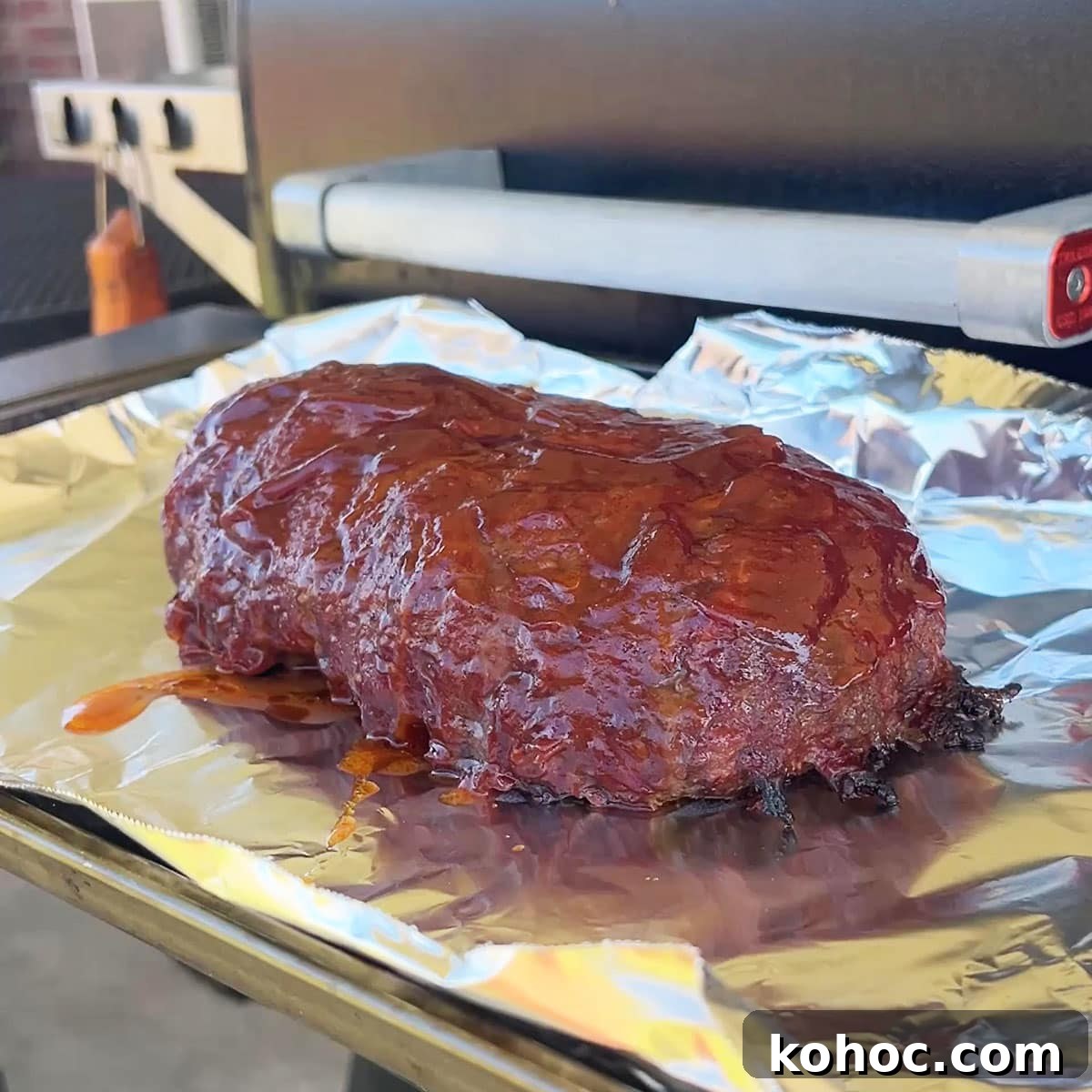 Smoked Meatloaf Recipe for Pellet Grills: Juicy, Flavorful Slice 14 The best smoked meatloaf recipe on a foil lined pan resting for 15 minutes.