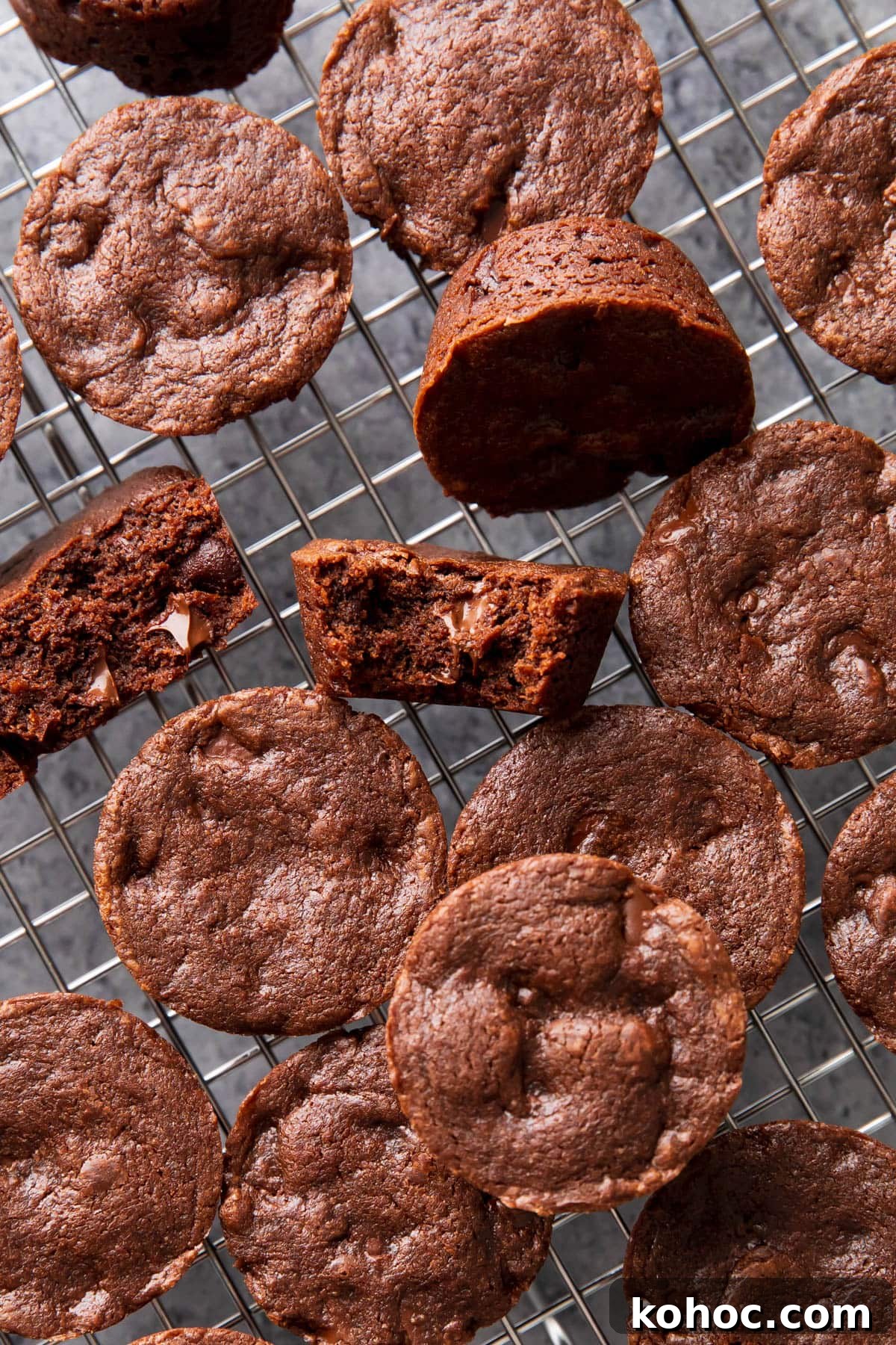 Chewy Fudgy Brownie Bites Recipe for Rich Chocolate Snacking 2 Moist and fudgy brownie bites cooling on a baking rack.