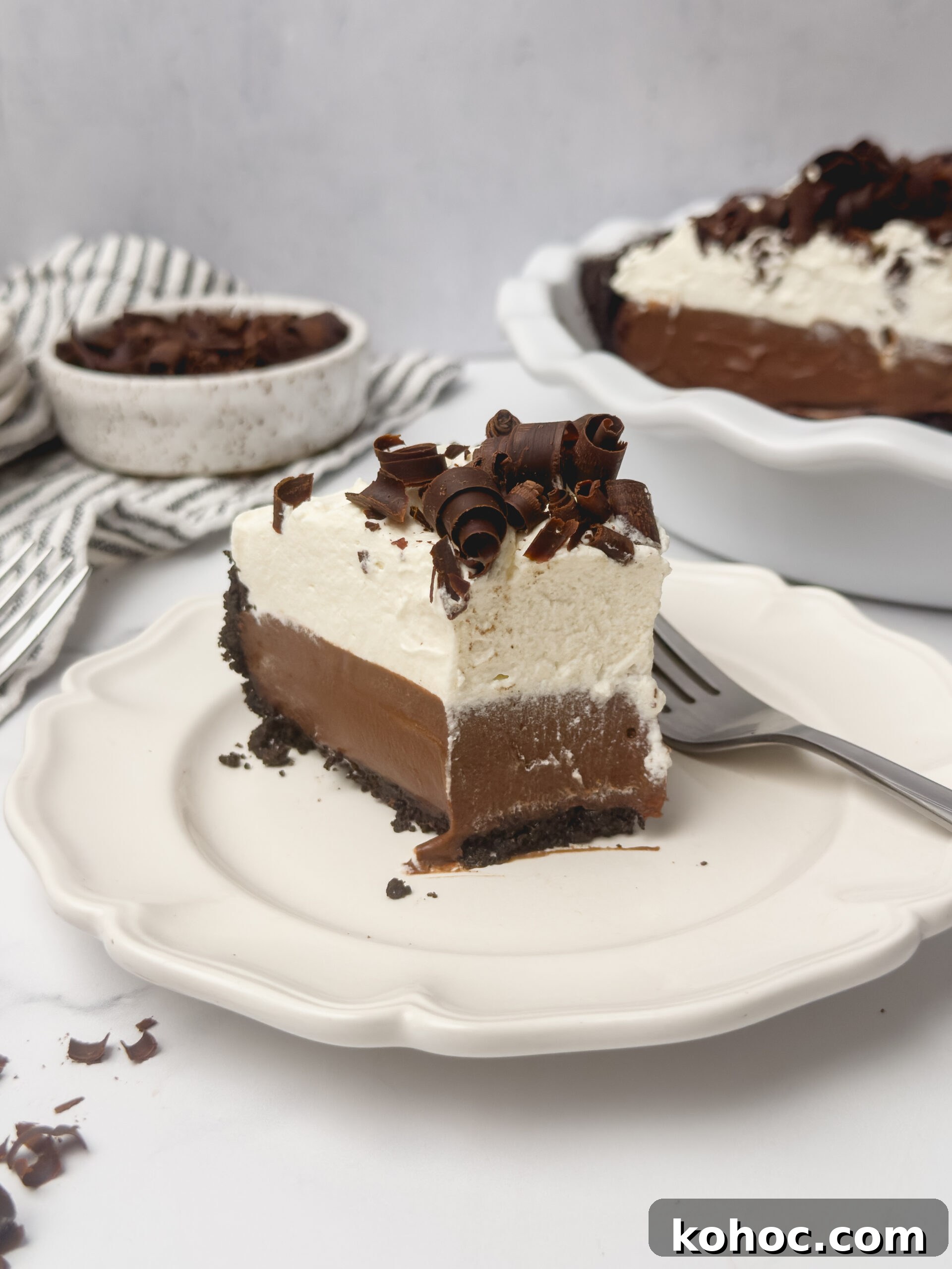 Decadent Chocolate Cream Pie Recipe with Silky Ganache Filling 6 Chocolate shavings on pie