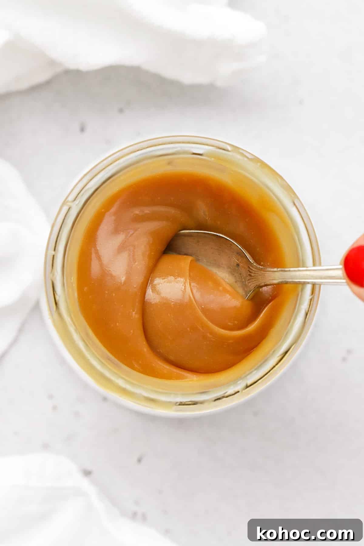 Homemade Caramel Sauce Recipe for Drizzling and Desserts 10 Using a spoon to stir easy homemade caramel sauce