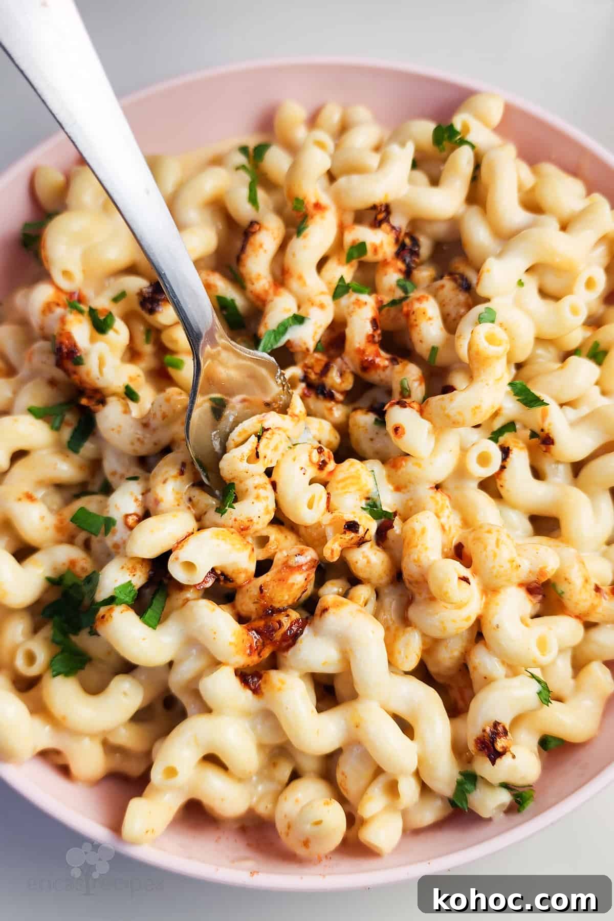 Creamy Cottage Cheese Macaroni Bake — High-Protein Comfort Food 2 mac and cheese in a pink bowl with fork