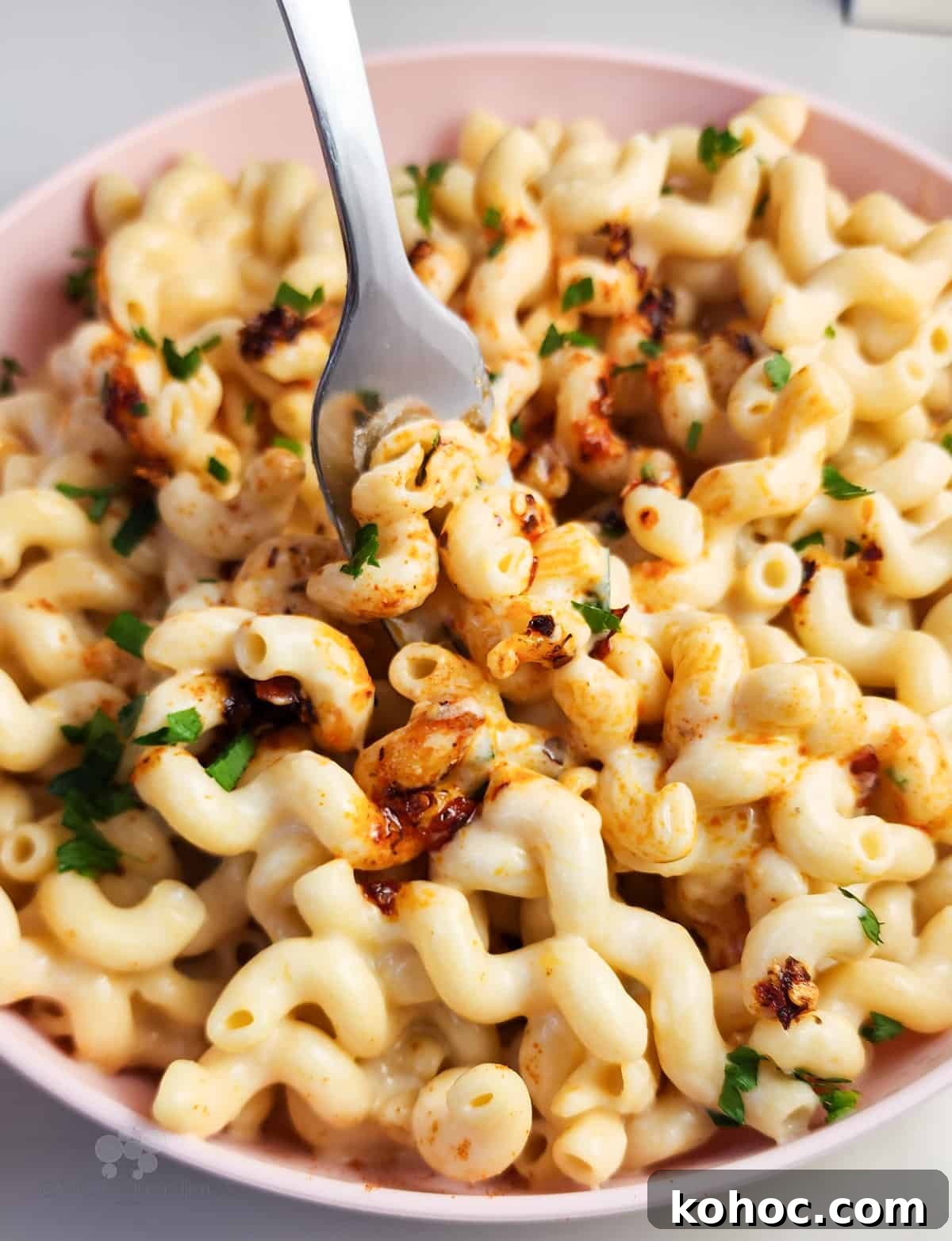 Creamy Cottage Cheese Macaroni Bake — High-Protein Comfort Food 4 mac and cheese in a pink bowl with fork