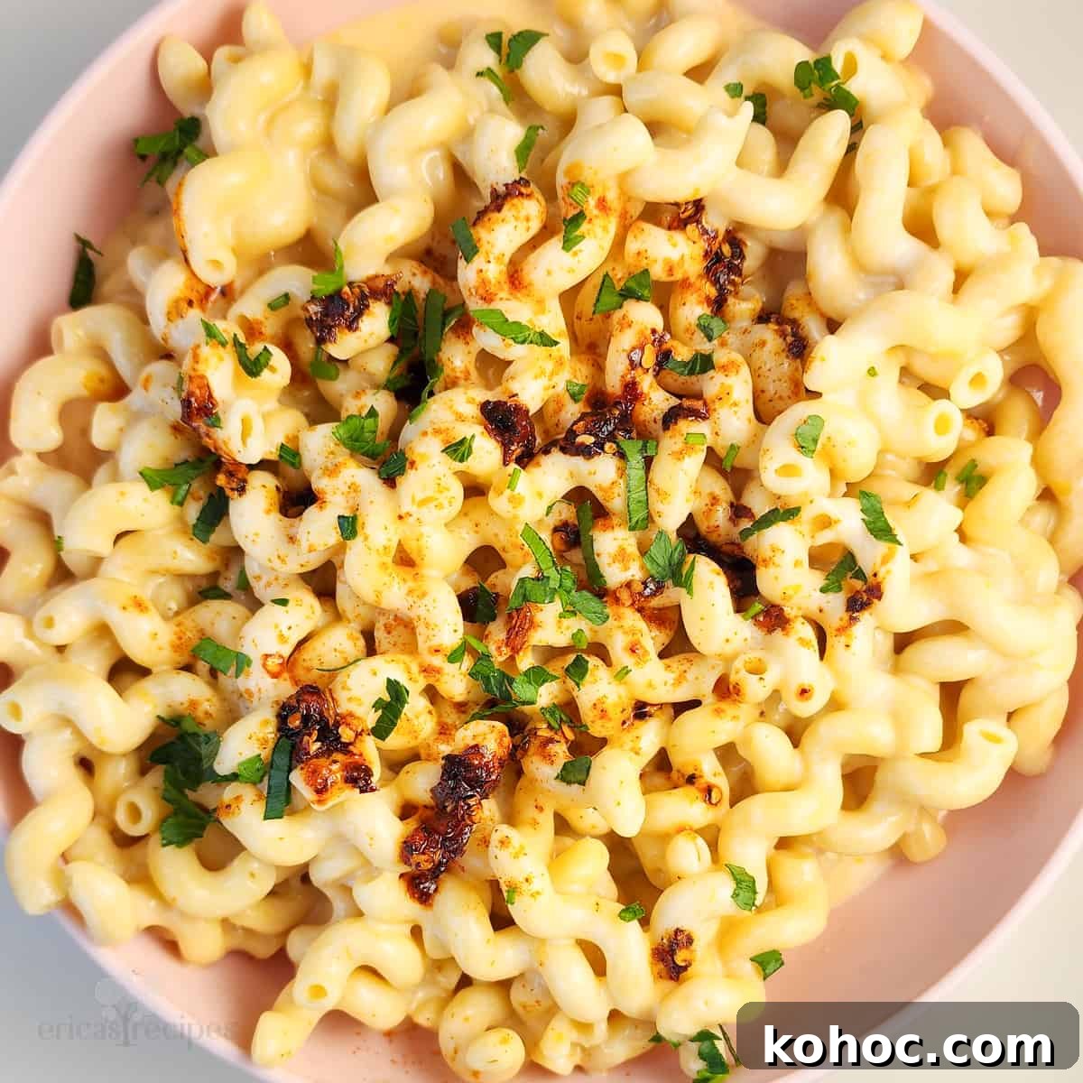 Creamy Cottage Cheese Macaroni Bake — High-Protein Comfort Food 5 mac and cheese in a pink bowl on white background