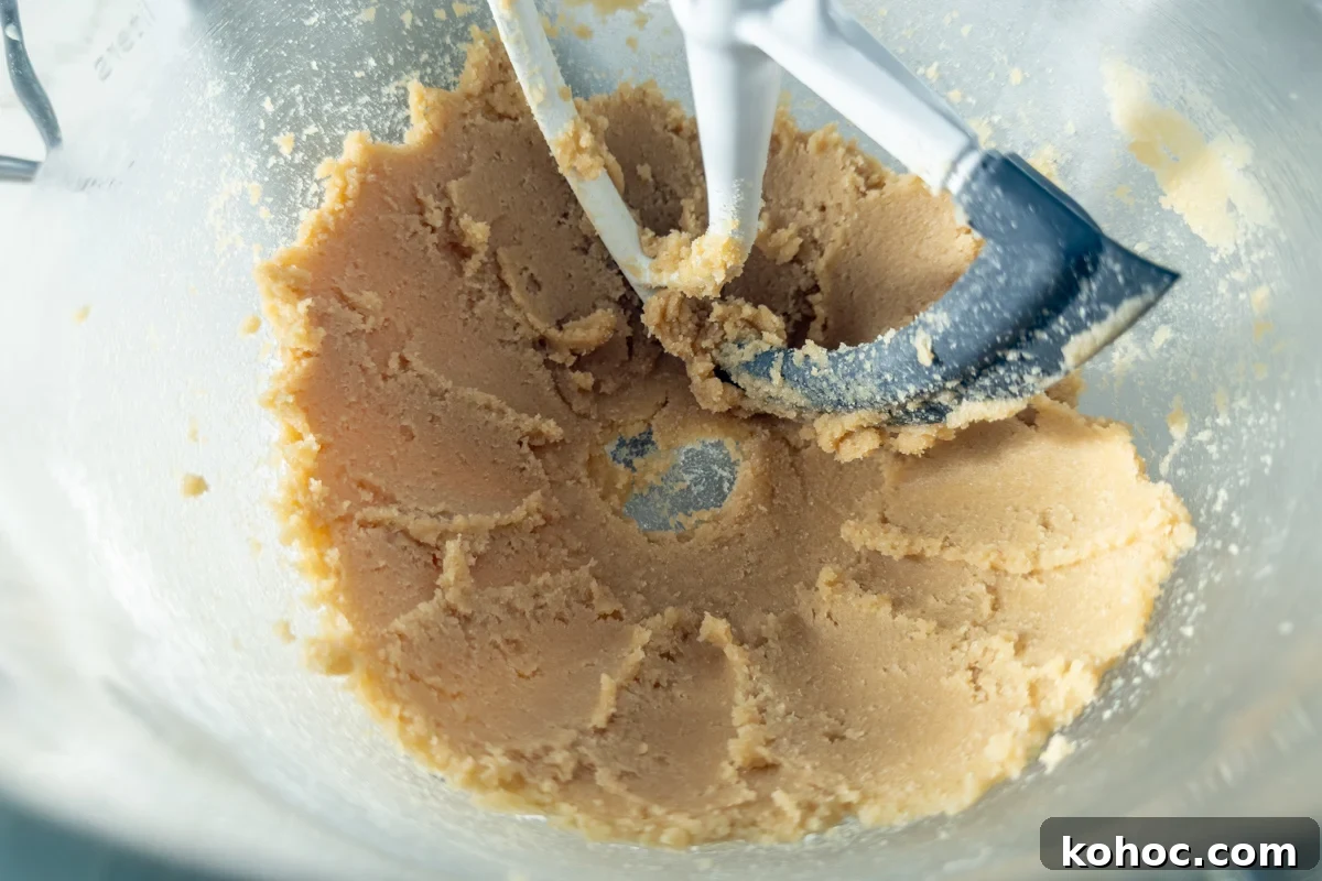 Gluten-Free Cookie Cake Recipe — Soft, Chewy Dessert Cake 8 Creamed butter and sugar mixture in a stand mixer bowl with paddle attachment.