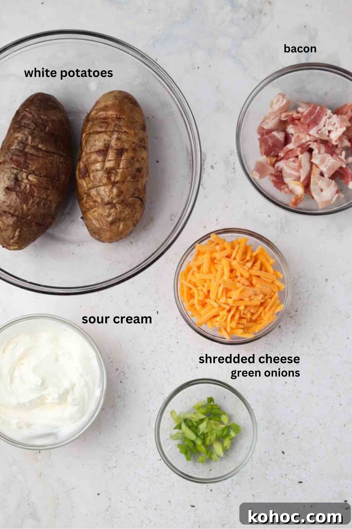 Crispy Air Fryer Potato Skins with Cheddar & Bacon 3 Air fryer potato skin ingredients in small glass bowls.